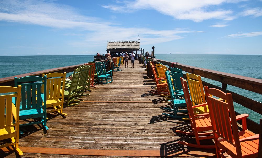 Colorful chairs along Westgate Cocoa Beach Pier