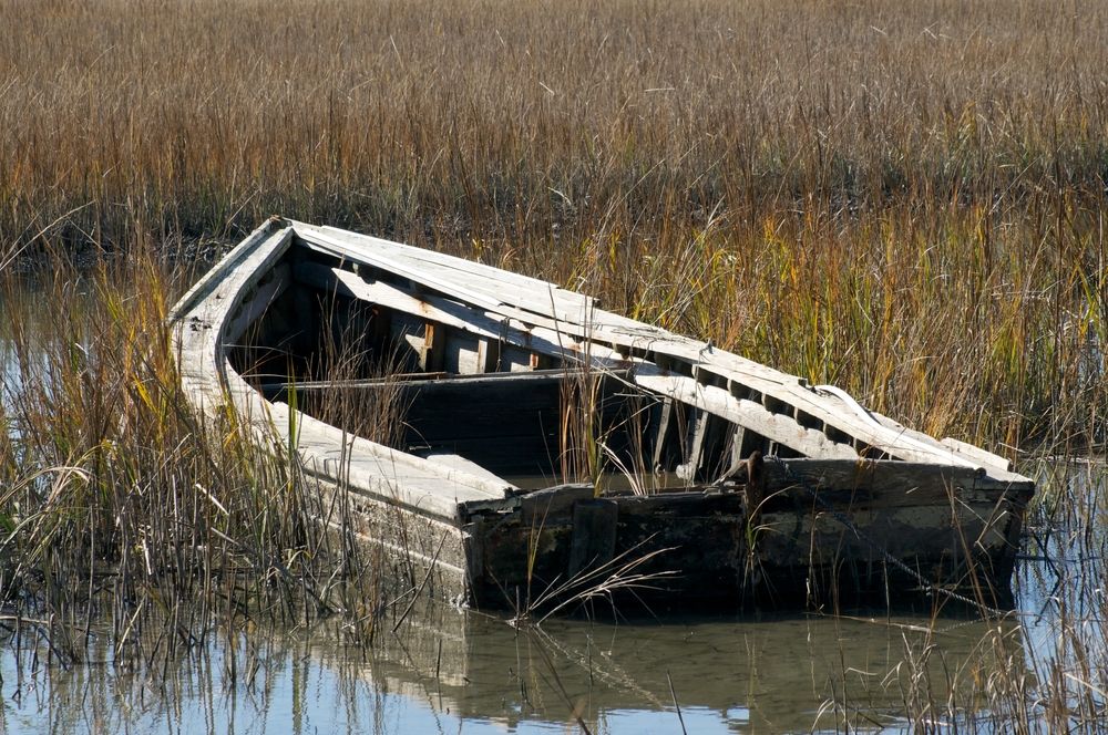 Abandoned boat on Eastern Shore of Virginia National Wildlife Refuge marshes
