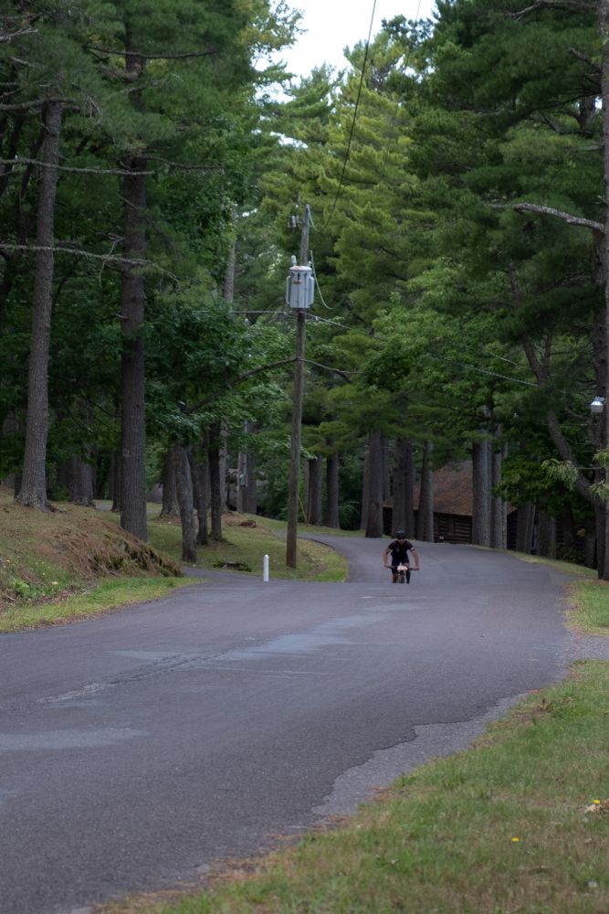Person riding a mountain bike along copper harbor