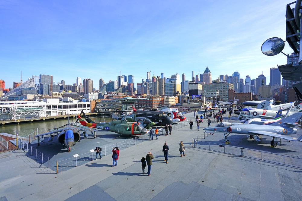 People admiring the exhibit in Intrepid Sea, Air & Space Museum