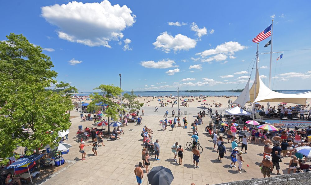 People walking around Orchard Beach