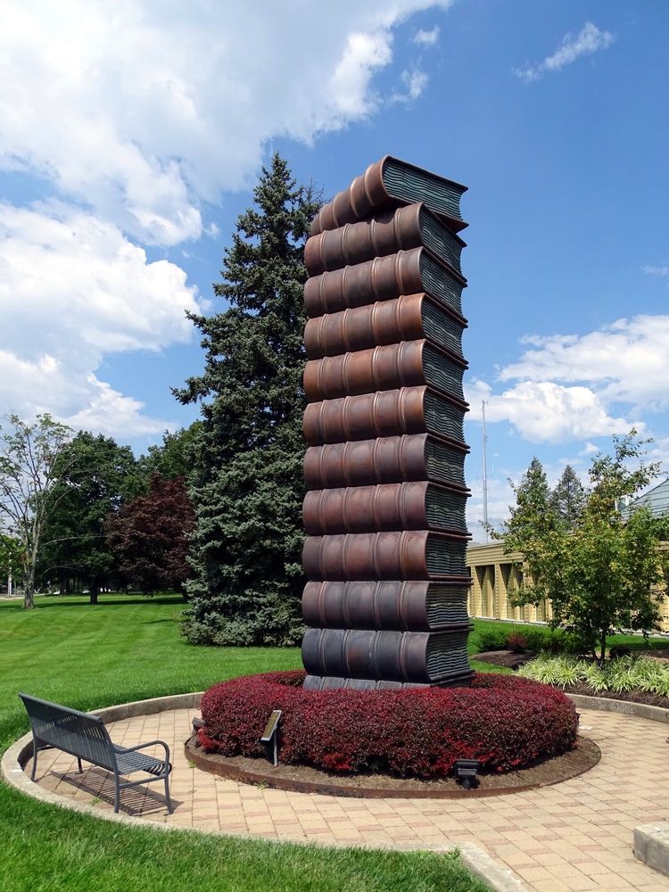 Giant stack of books sculpture on the grounds of Centerville Library