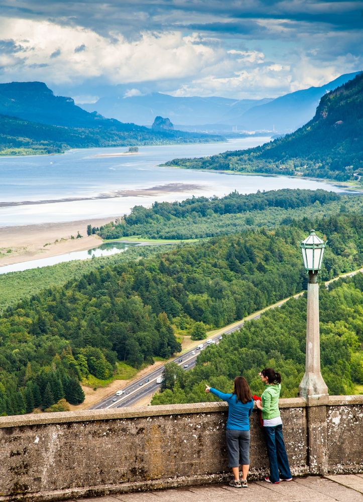 People at the Vista House in Crown Point's overlook