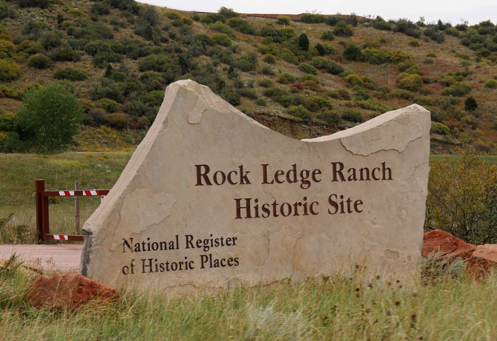 Welcome sign of the Rock Ledge Ranch Historic Site