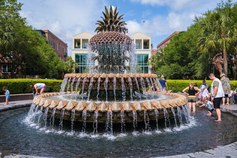 People enjoying the waters of Joe Riley Waterfront Park's pineapple fountain