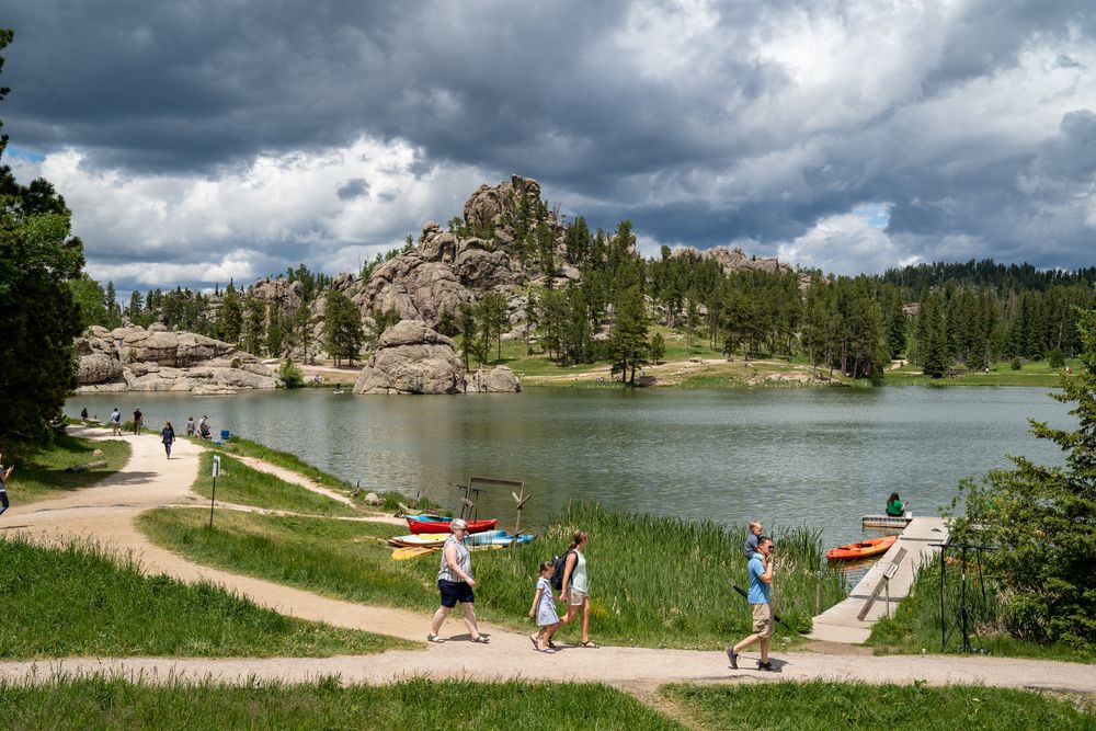 People enjoying the day at Sylvan Lake
