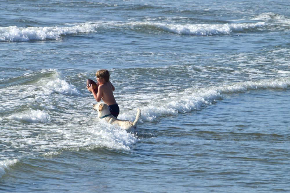 A kid swimming at Fiesta Island