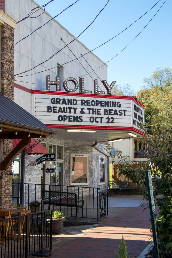 Exterior and show schedule of Holly Theatre