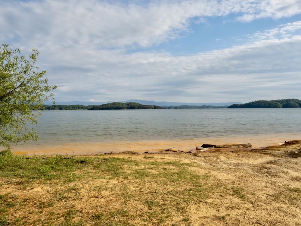 Daytime view of Douglas Lake and the great smoky mountains