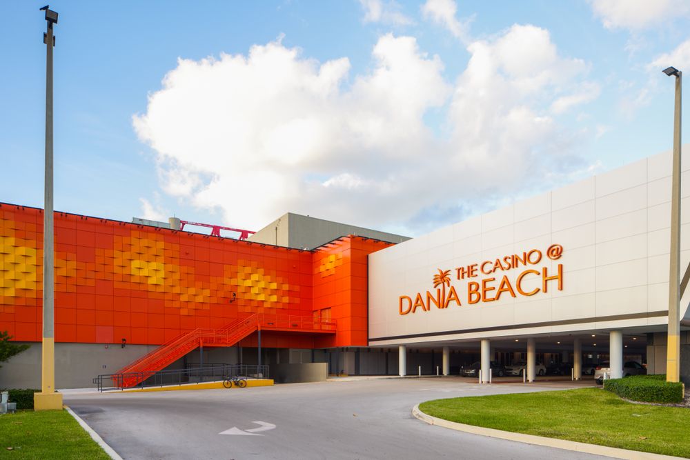 Dark orange and cream colored exterior walls of the casino @dania beach bulding.