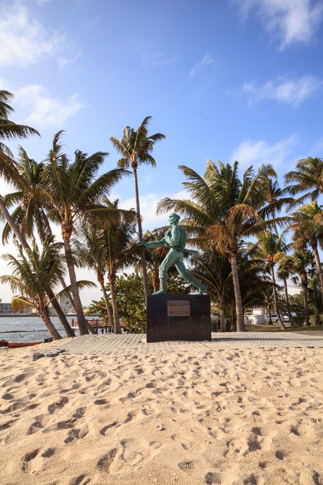 Daytime view of Barefoot Mailman Statue