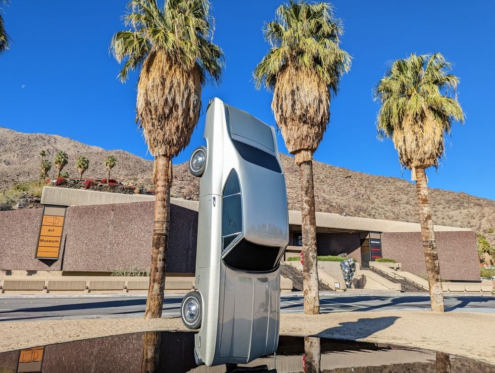 A vertical car display at Palm Springs Art Museum.
