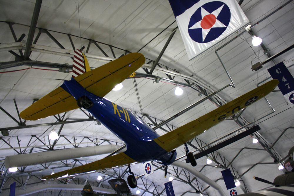 An aircraft hanging inside Air Mobility Command Museum