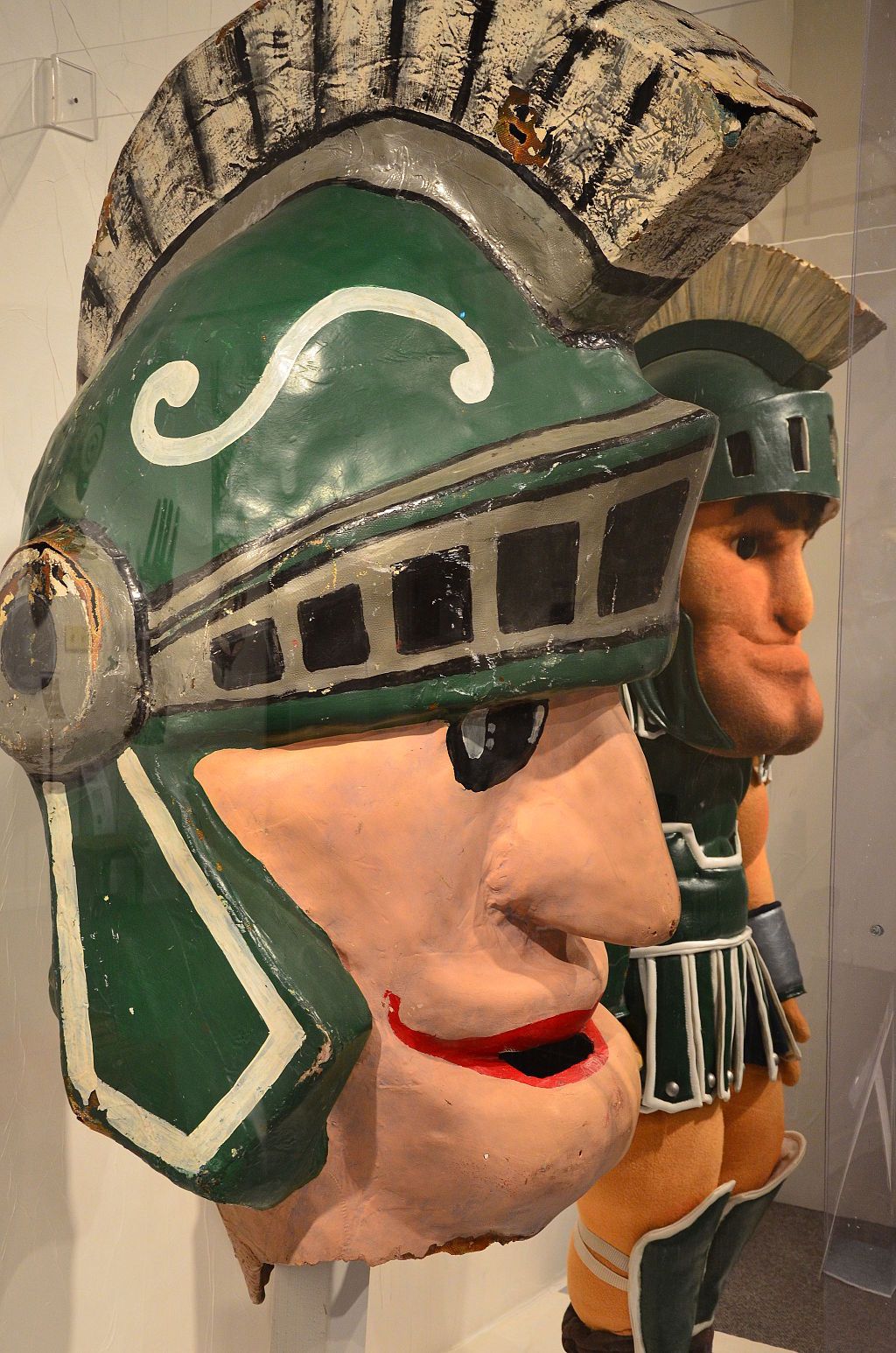 A spartan mask exhibit inside the MSU Museum.