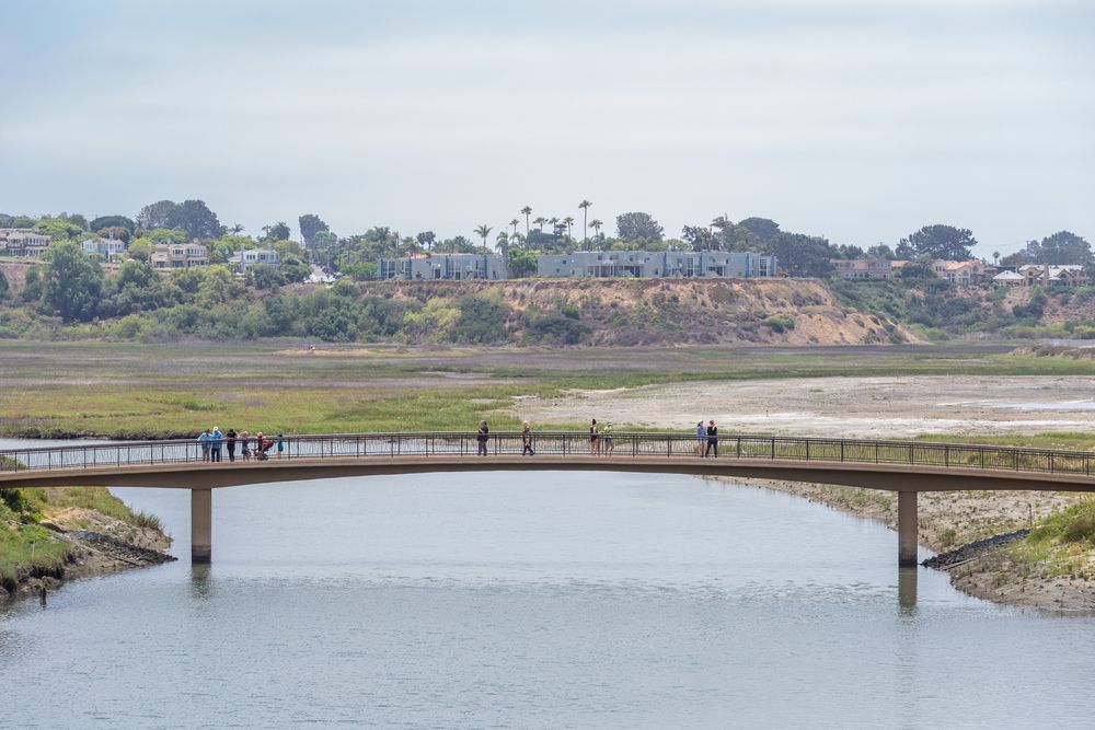 People along San Elijo Lagoon Ecological Reserve's footbridge