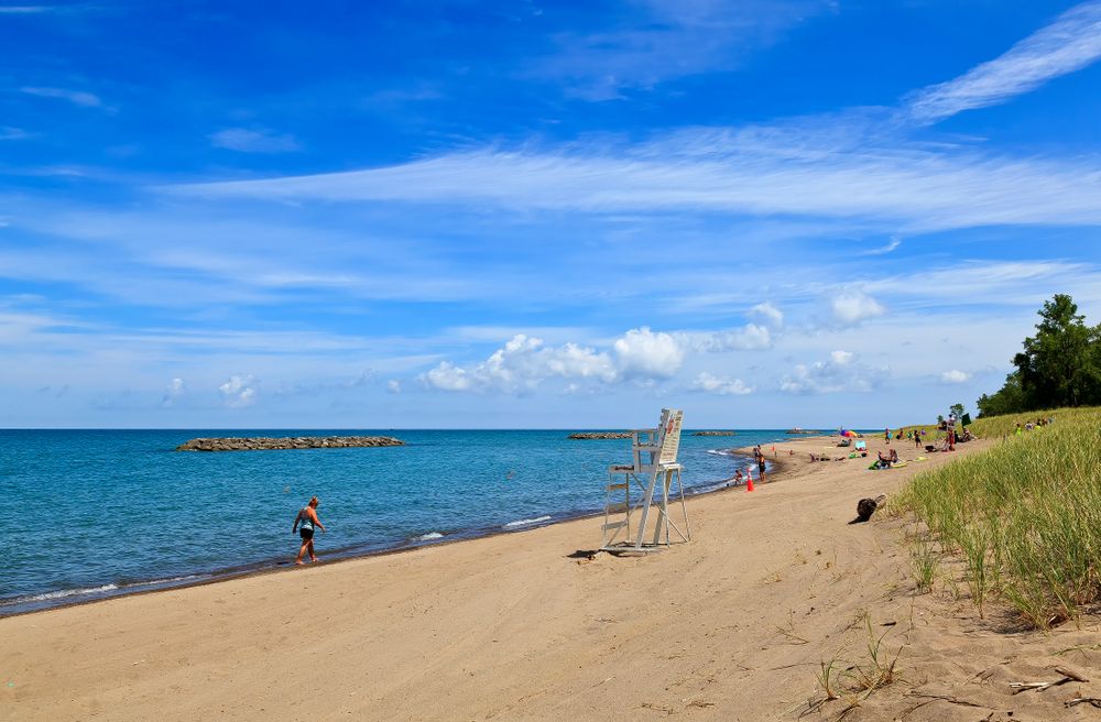People swimming at Presque Isle State Park's waters
