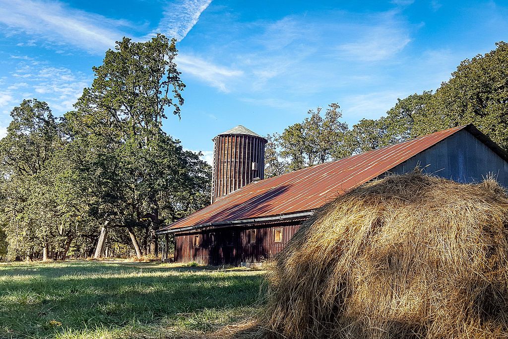 Haystack in front of Mount Pisgah Arboretum's barn