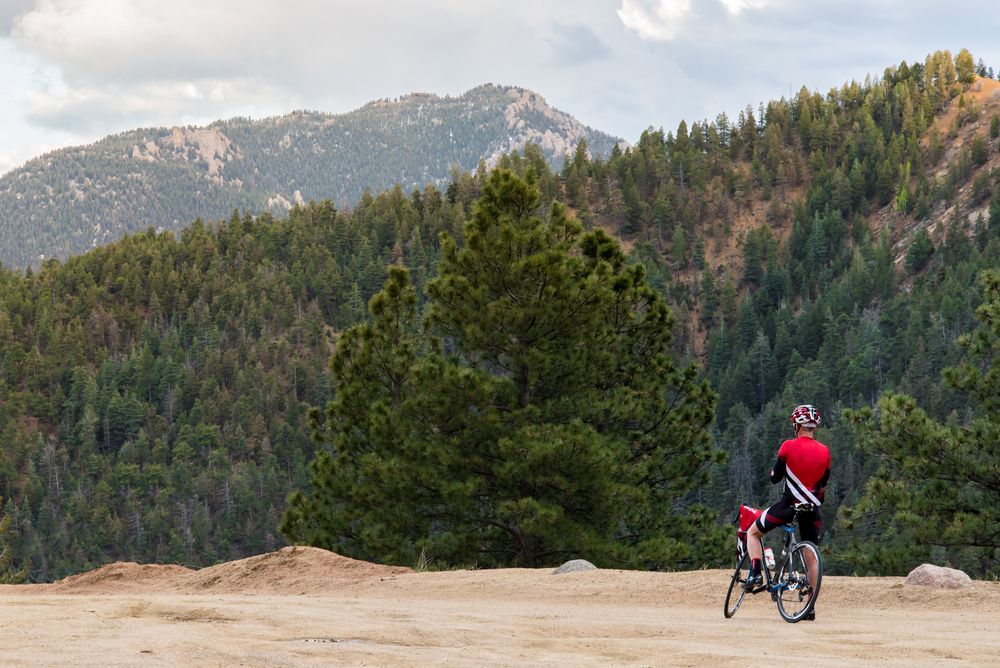 A person with his bicycle at North Cheyenne Canyon Park