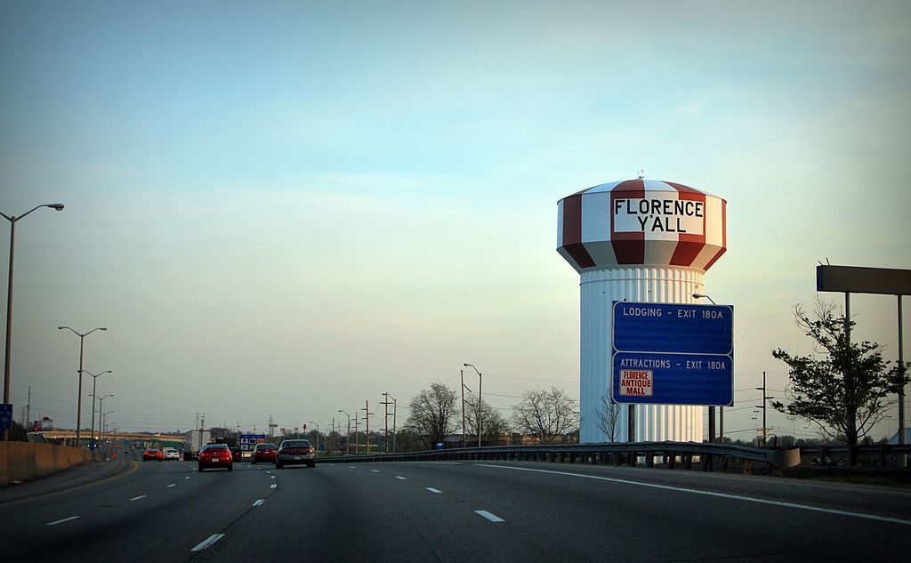 The Florence Y'all Water Tower beside the highway