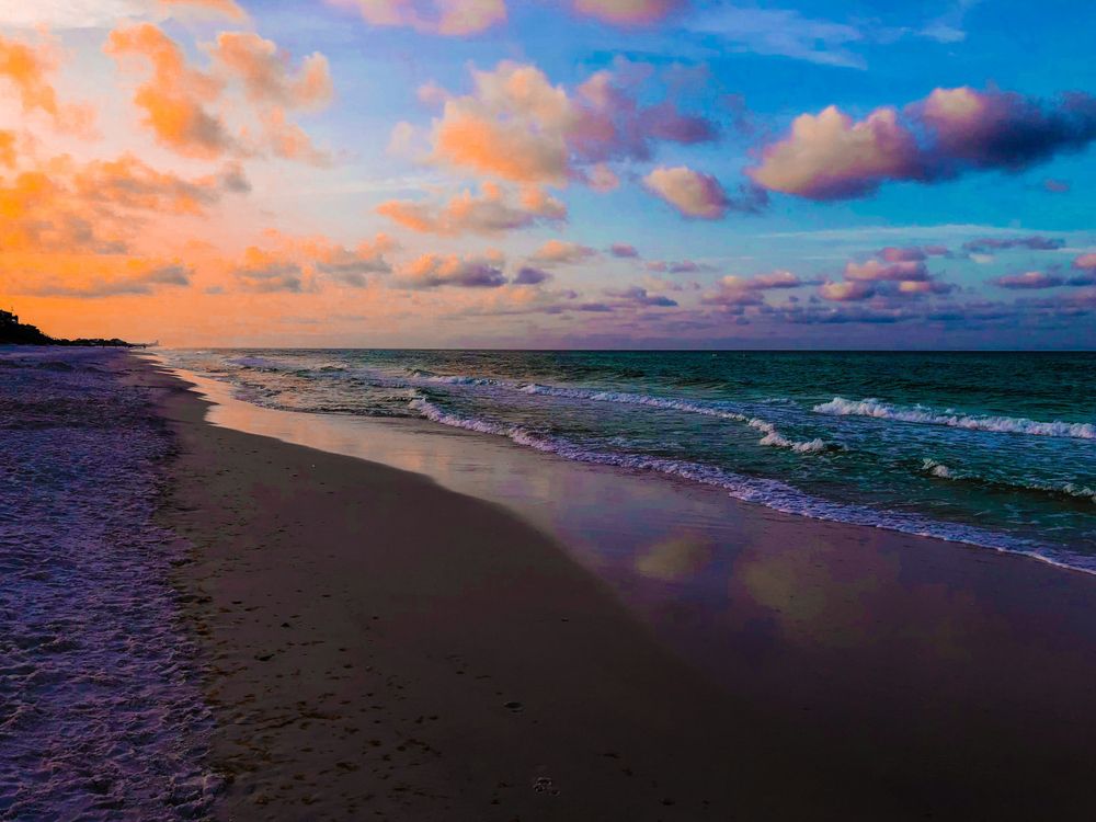 Colorful sunset over Blue Mountain Beach