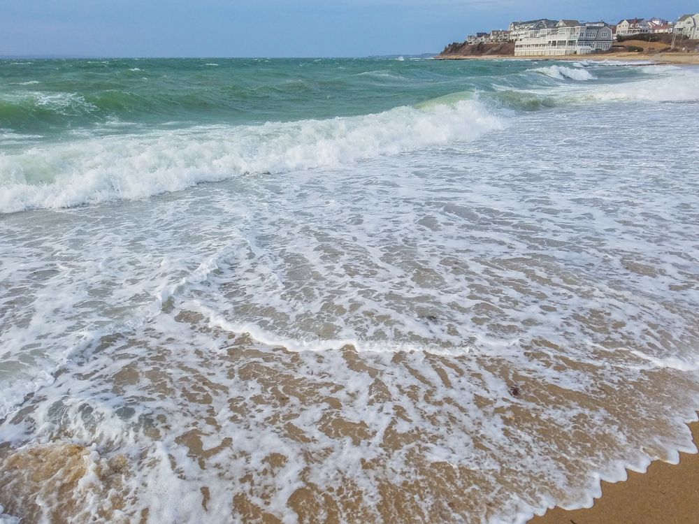 Waves crashing on Falmouth Beach's shore