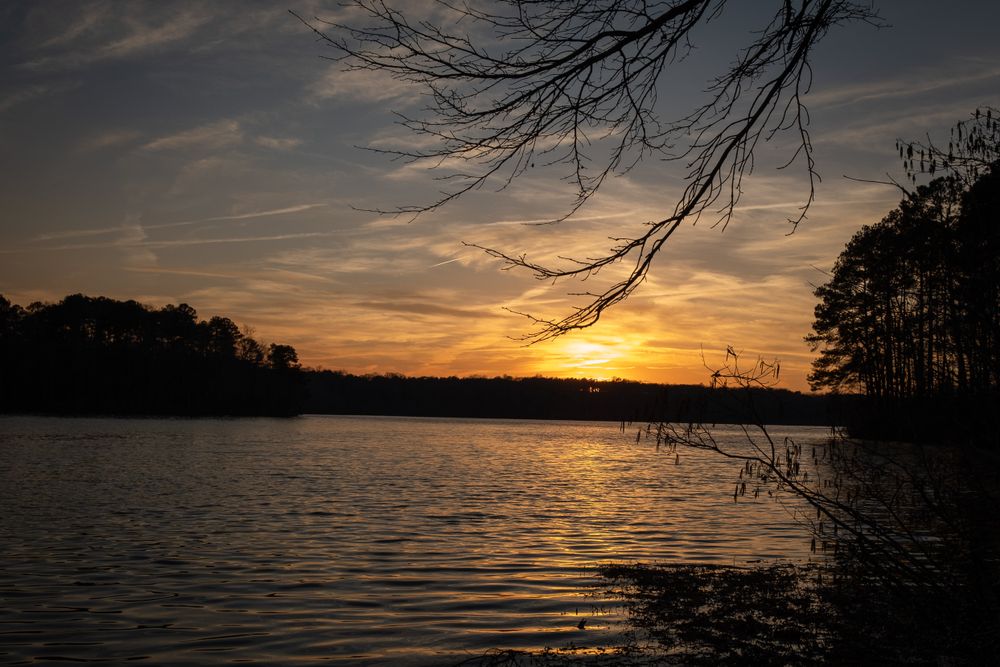 Sunset reflecting on the waters of Lake Benson Park