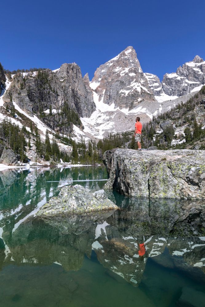 A person admiring Delta lake