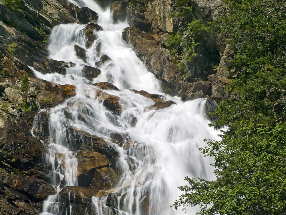 The rushing waters of Hidden Falls