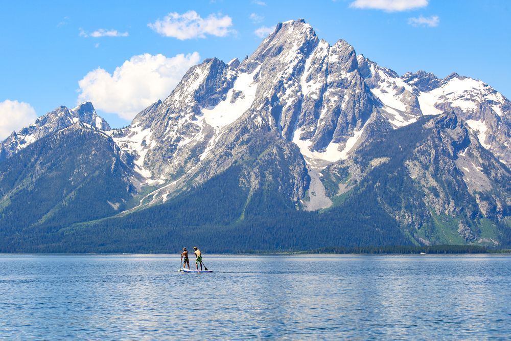Men paddle boarding on Jackson Lake
