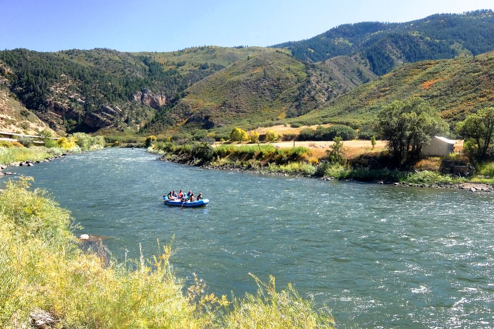 People rafting at Glenwood Canyon's river