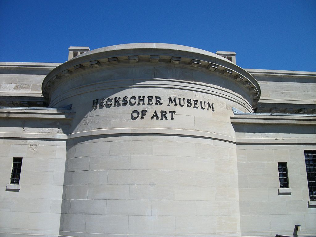 Name of the heckscher museum of art near the roof the of the building.