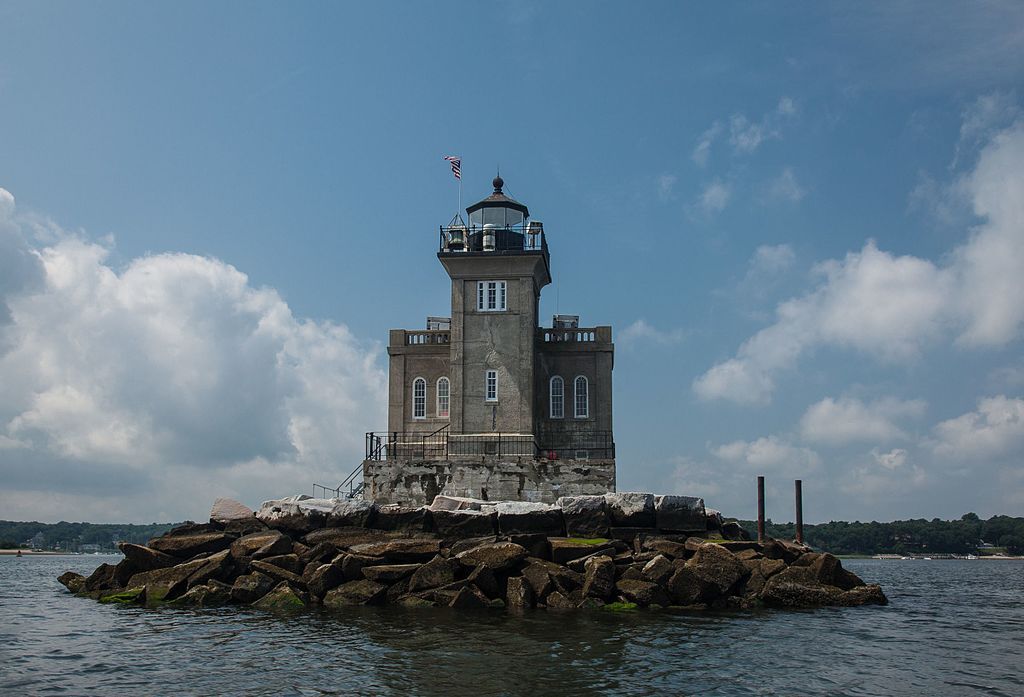 Body of water surrounding the land holding the lighthouse.
