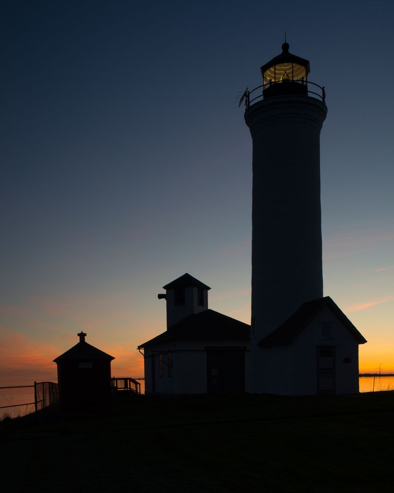 Silhouette of the Old Tibbetts Point Lighthouse during sunset