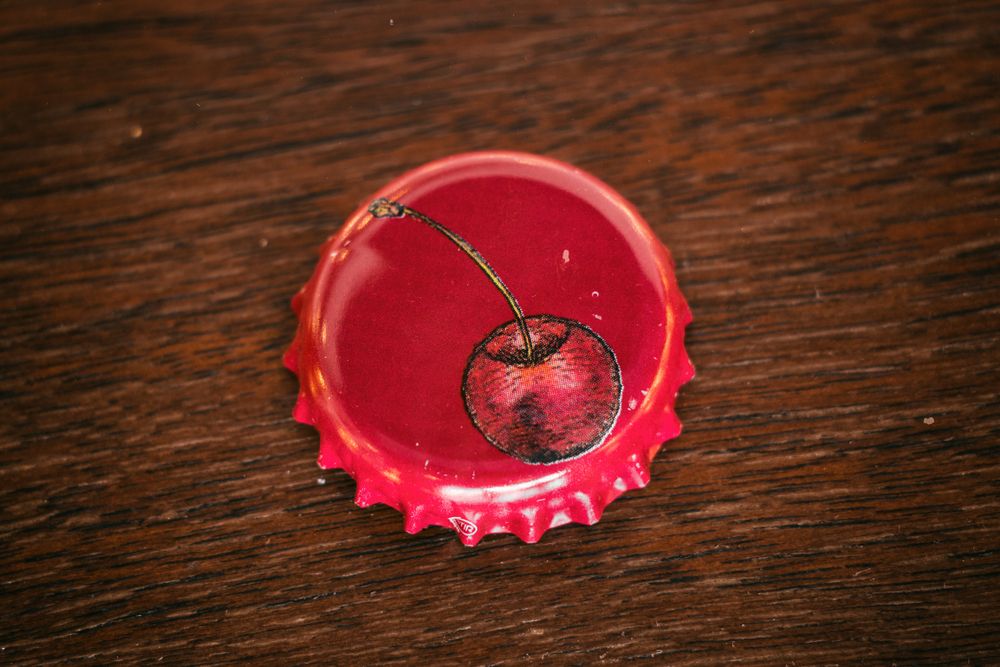 Bell's Brewery cherry beer bottle cap on a table