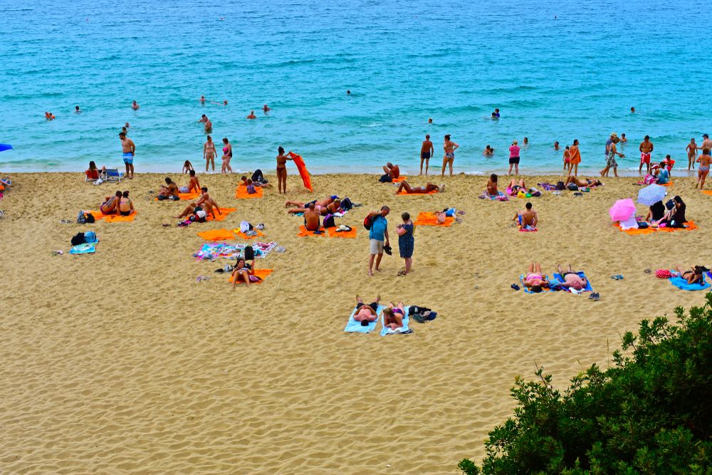 People enjoying the sun at Makris Gialos