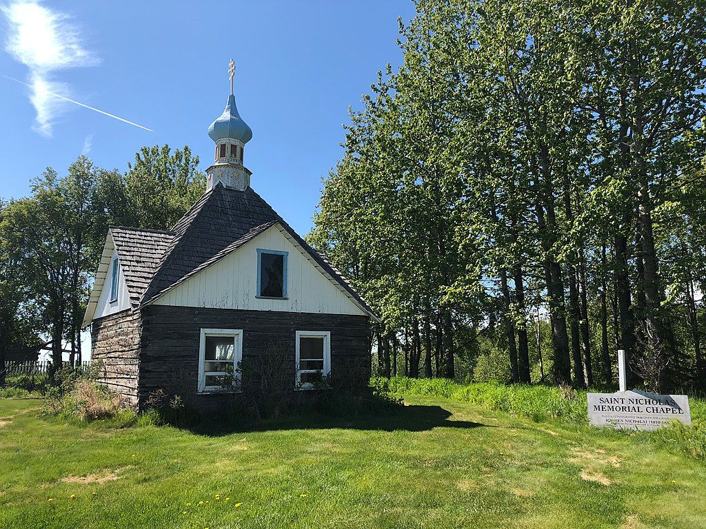 Exterior and name sign of Saint Nicholas Memorial Chapel.