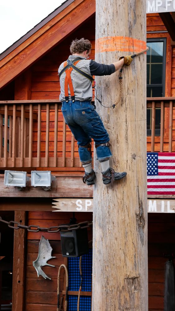 A man on a wooden pole during the Great Alaskan Lumberjack Show