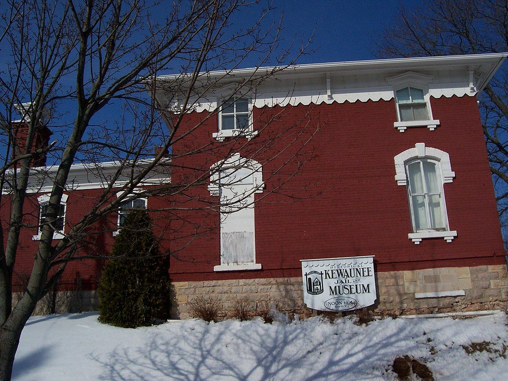 Welcome sign and facade of the Kewaunee County Jail Museum
