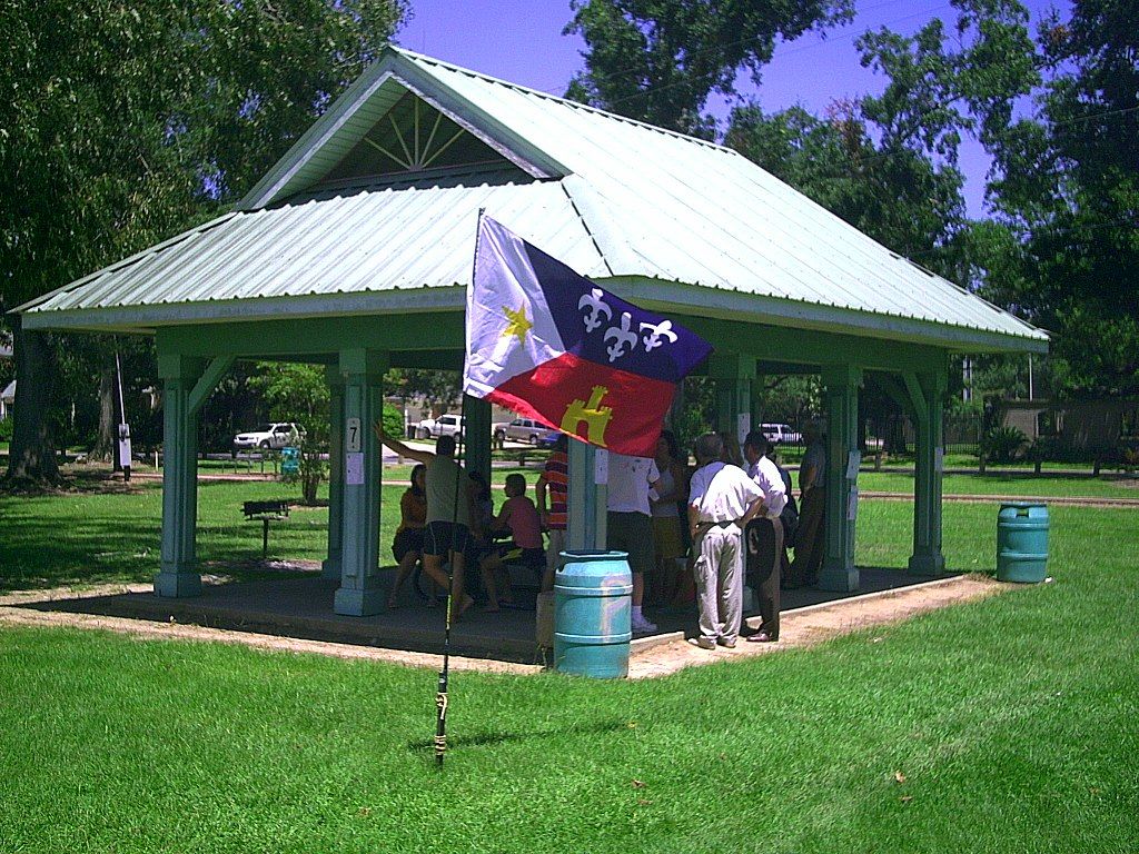People under a shed at Girard Park