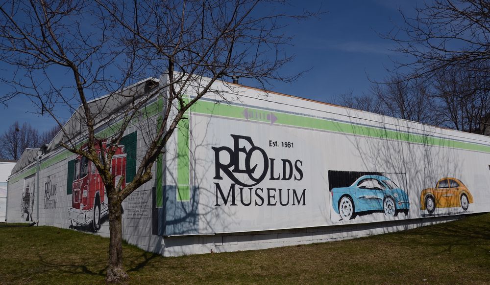 Exterior and name sign of R.E. Olds Transportation Museum