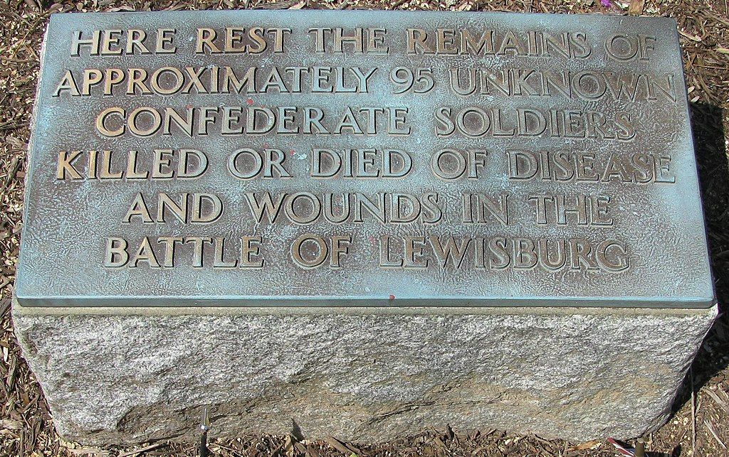 A marker for mass grave at confederate cemetery.