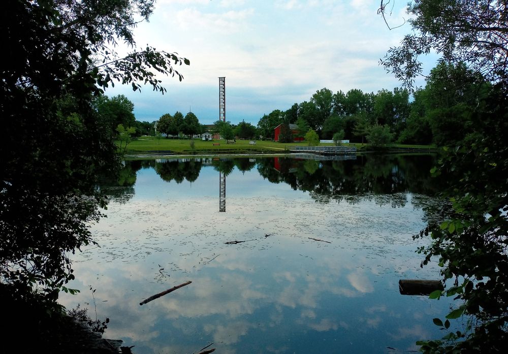 View of Meridian Historical Village from across a lake