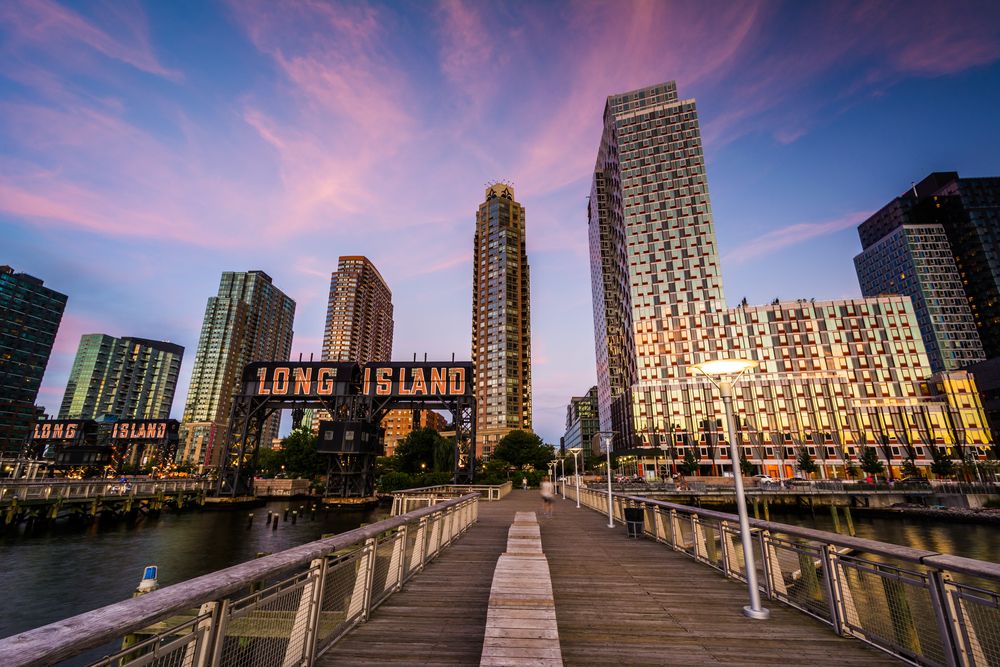 Sunset behind gantry plaza bridge.