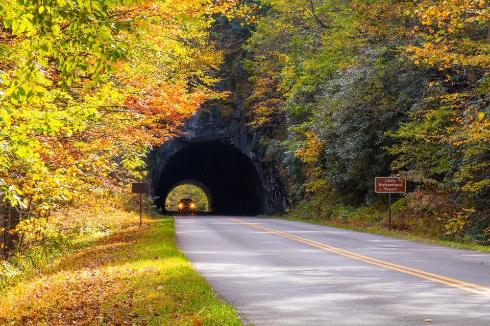 A car passing through The Little Switzerland Tunnel