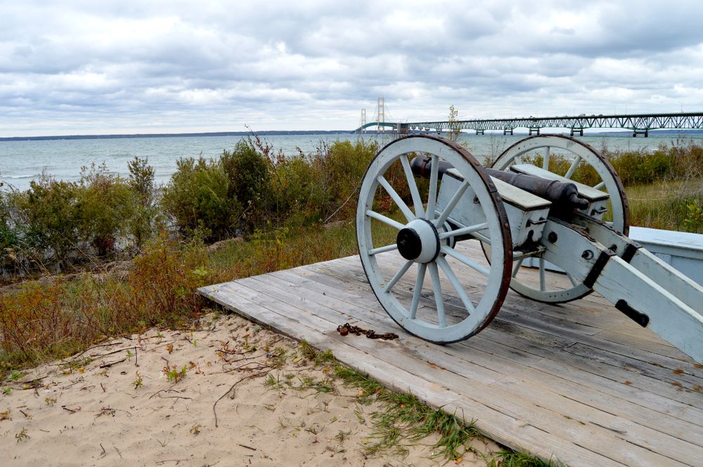 A canon displayed on the grounds of Fort Michilimackinac State Park