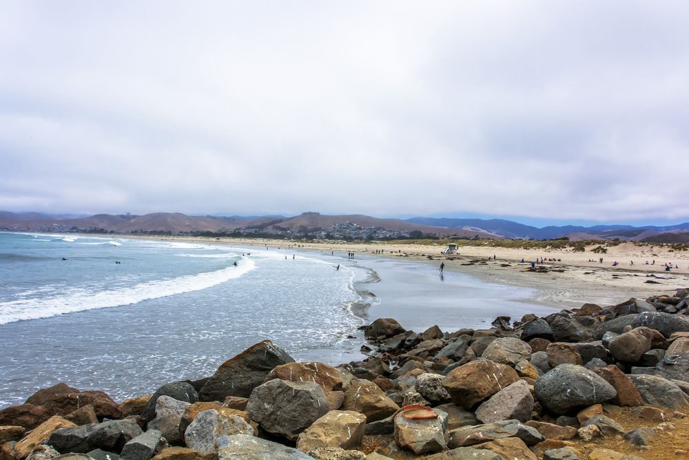 People enjoying the sun at Morro Strand State Beach