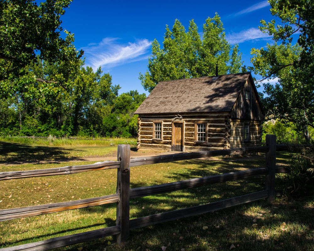 Exterior and fence of Maltese Cross Cabin