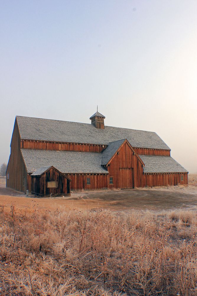 Near exterior view of the historic Tate Barn