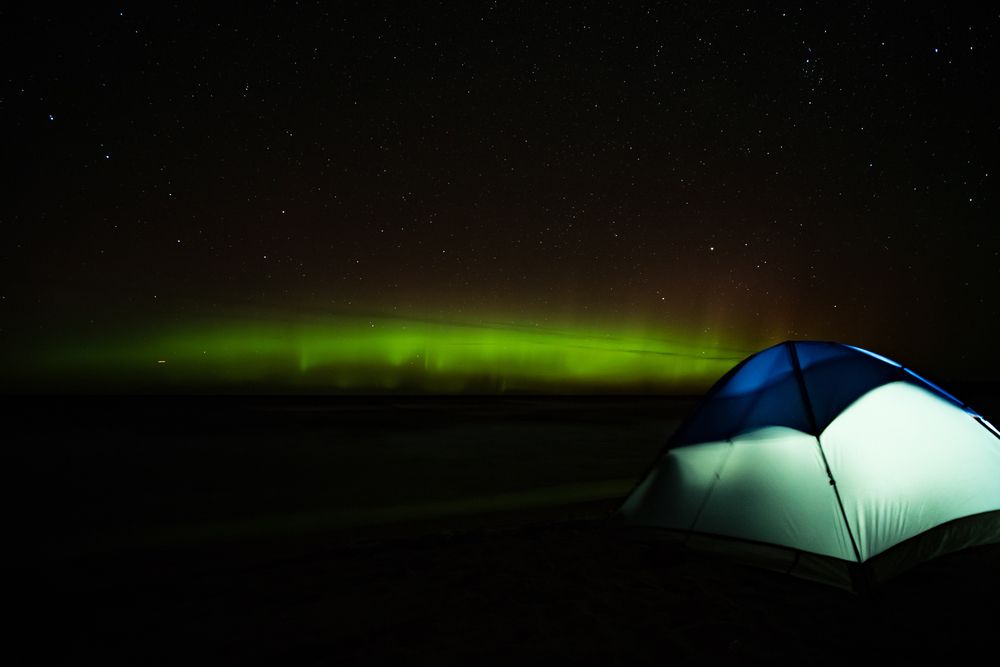 Camping under Marquette Northern Lights