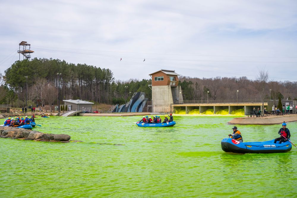 Green-dyed water of U.S. National Whitewater Center for it's annual festival